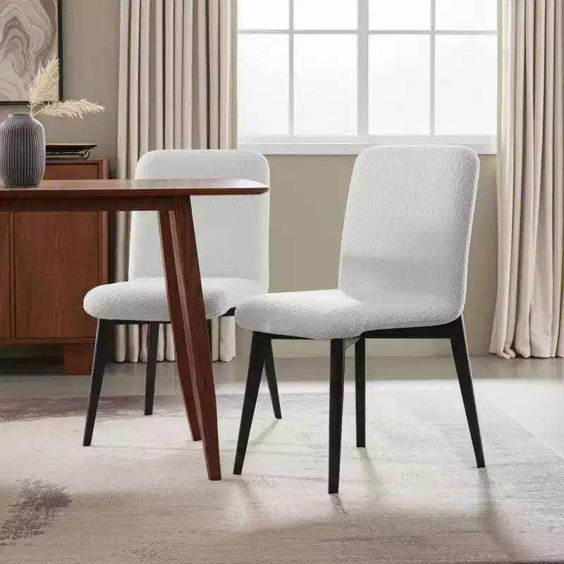 Ensemble de deux chaises de salle à manger bouclettes, blanches et noires