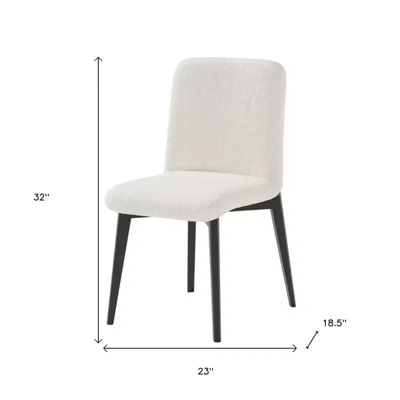 Ensemble de deux chaises de salle à manger bouclettes, blanches et noires